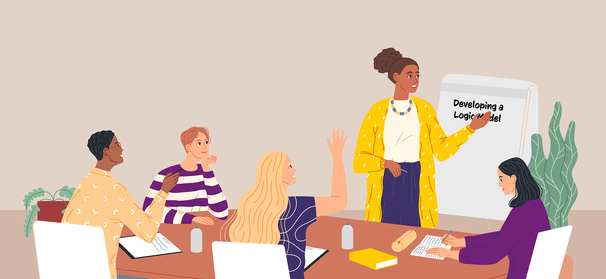 A person in giving a presentation in an office settings. She is pointing to a chart titled 'Developing a Logical Model'