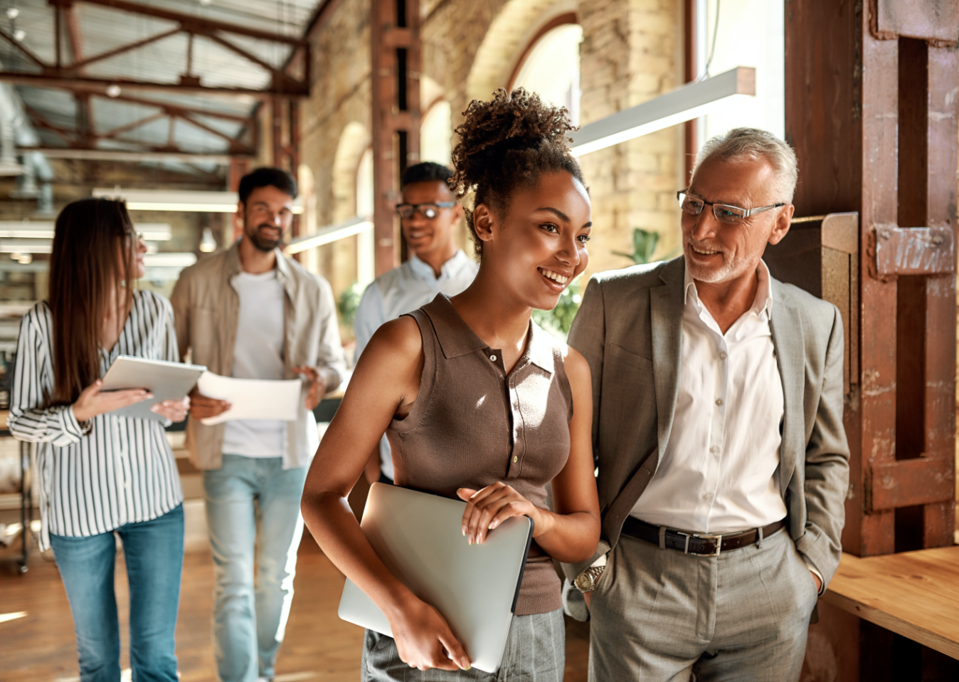 coworkers walking down the hall