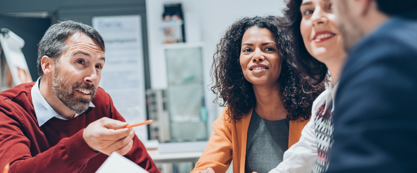 man sharing idea to group