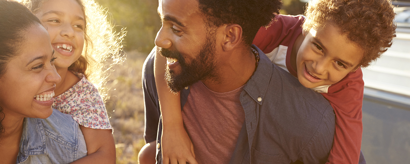 Three people smiling and clapping